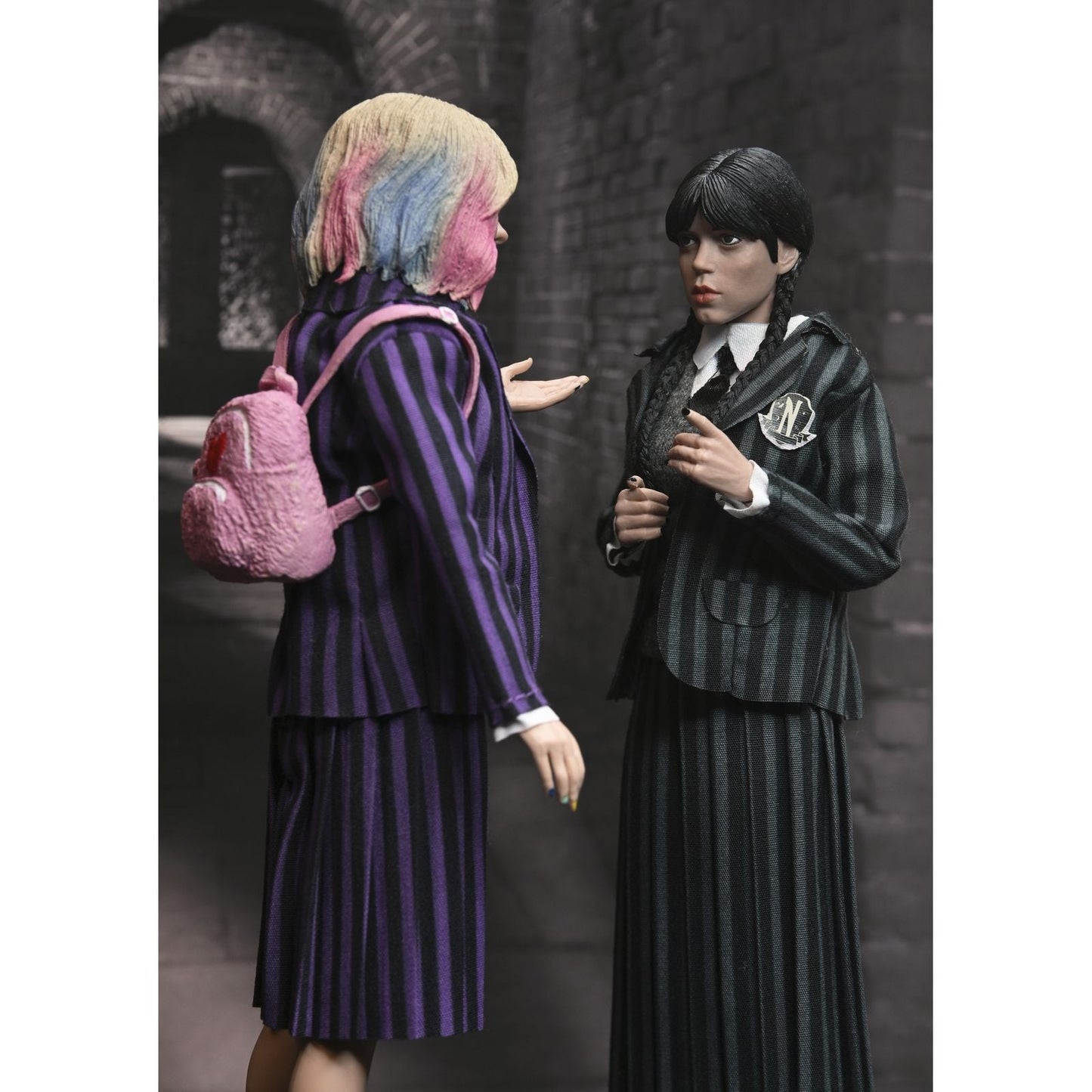 WEDNESDAY ADDAMS & ENID SINCLAIR NEVERMORE UNIFORM VERSION PACK 2 CLOTHED ACTION FIGURAS 20 CM WEDNESDAY