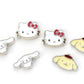 Sanrio Juego de Pendientes de Botón Hello Kitty, Cinnamon Roll y Pompompurin