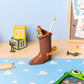 Disney Pixar Toy Story Portalápices con set de papelería Bota de Woody 16 cm